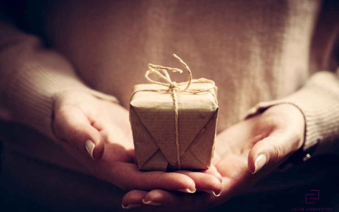 Woman holding gift in her hands